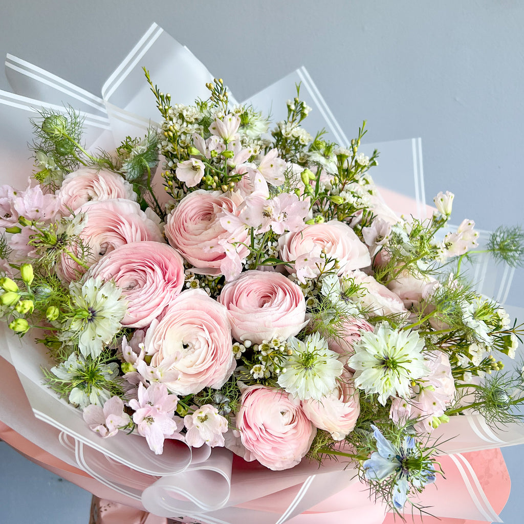 ranunculus and succulent bouquet Ranunculus Bouquet – Mariams Flowers