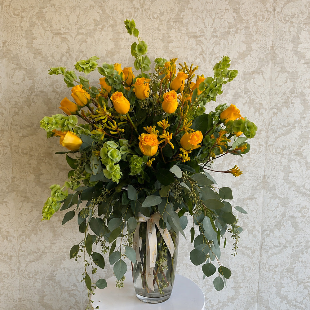 24 Yellow Roses In A Vase
