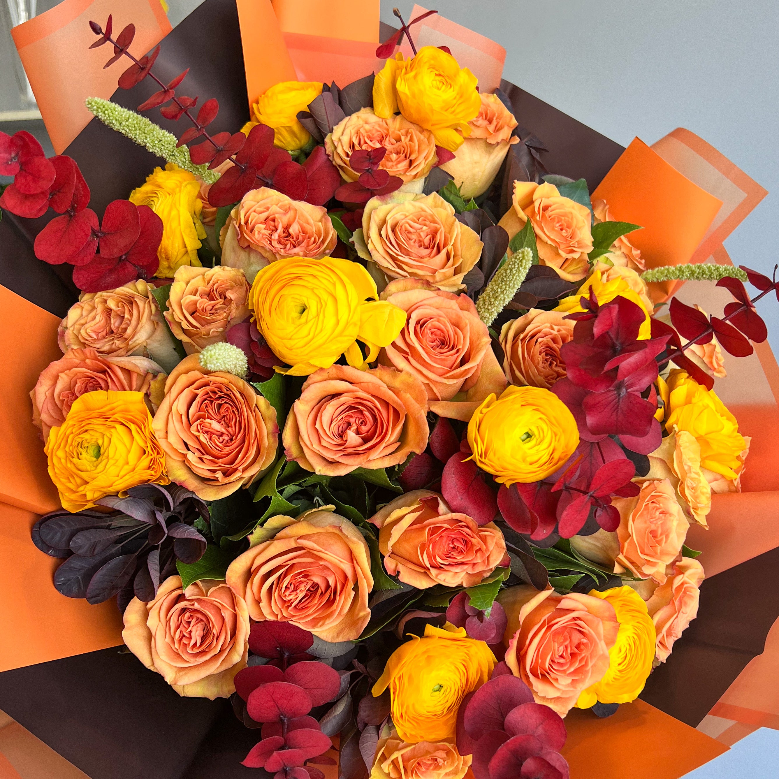 Orange Roses and Ranunculus