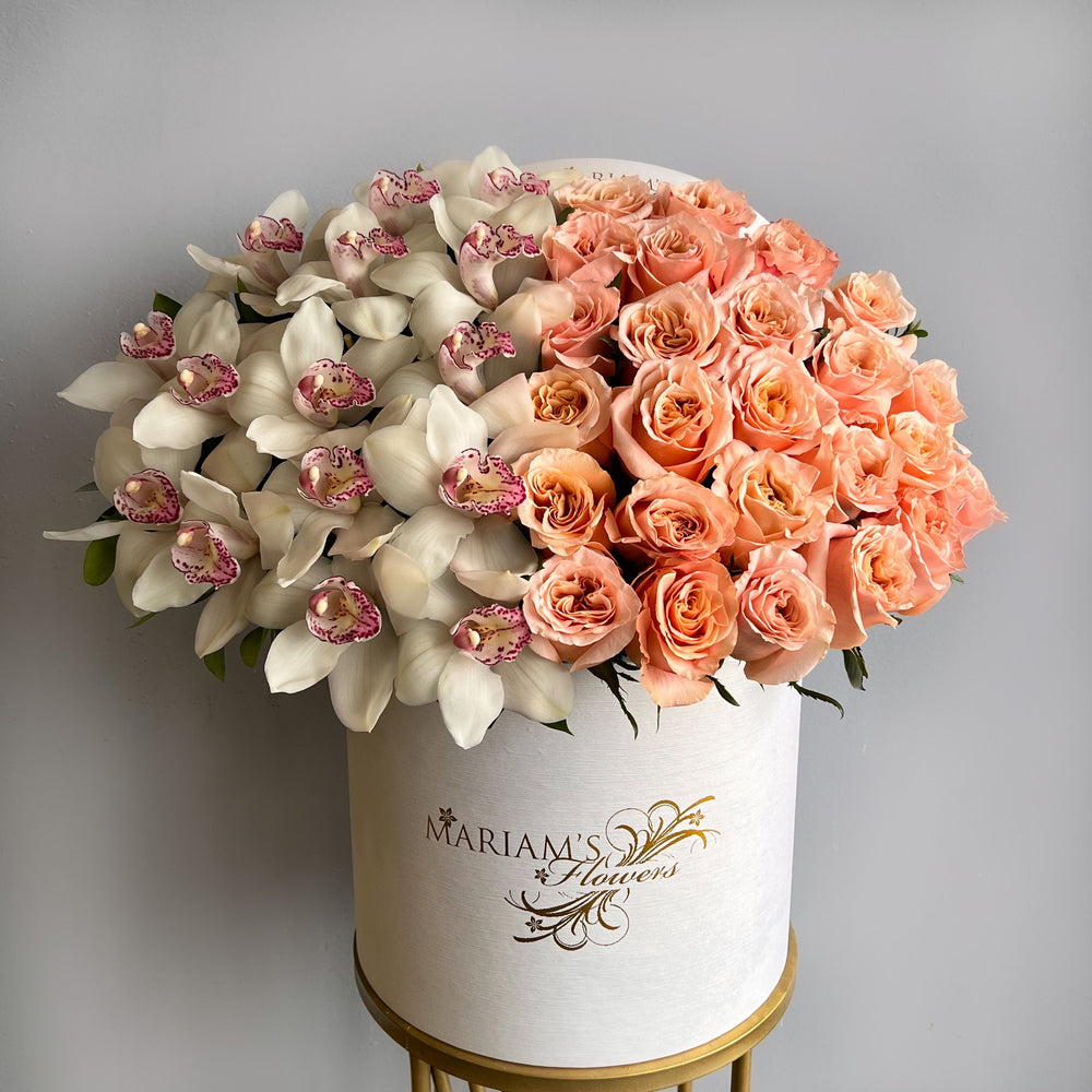 Women's Day White Orchids and Peach Roses