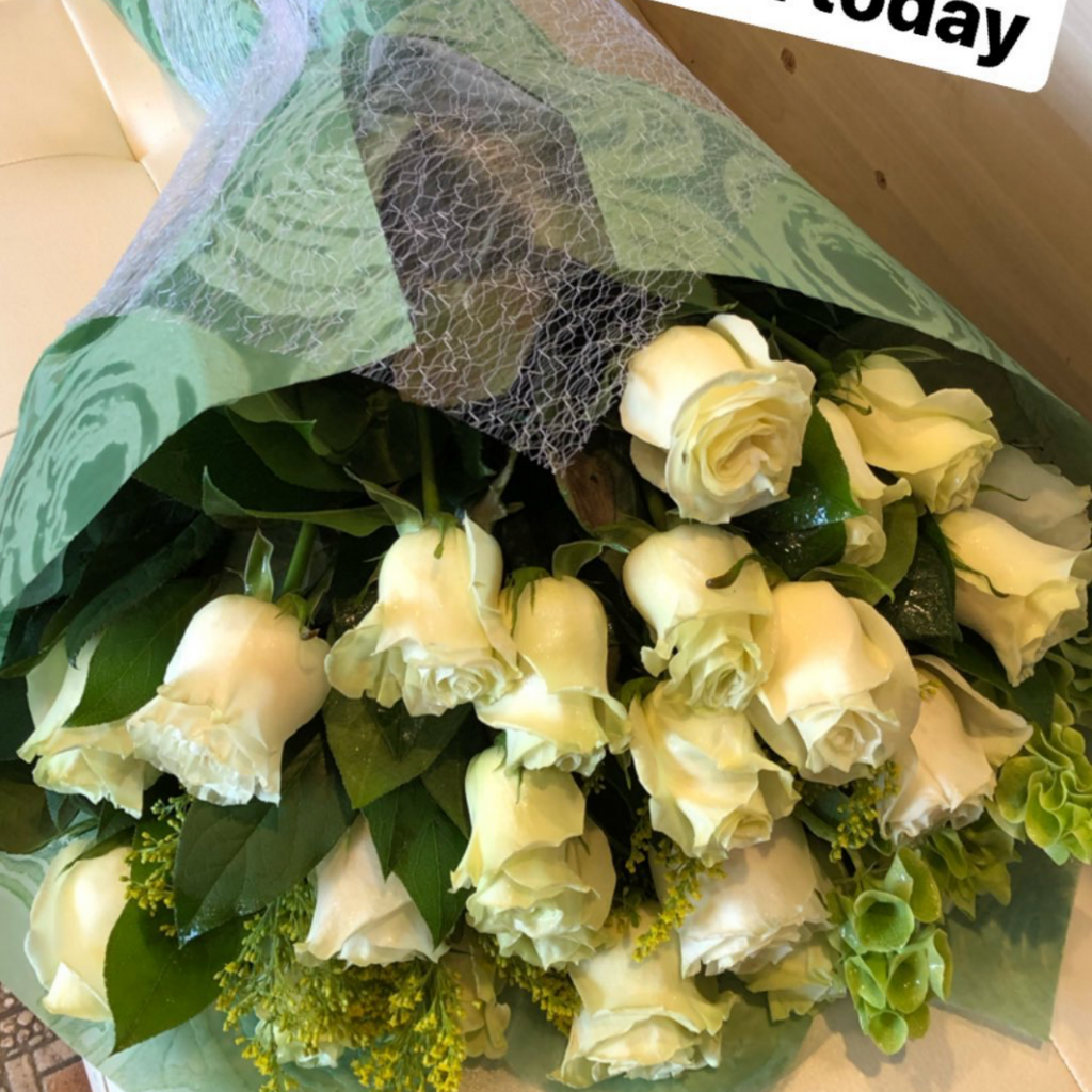 White Roses Wrappings A Wrapped Bouquet of White Roses – Mariams Flowers